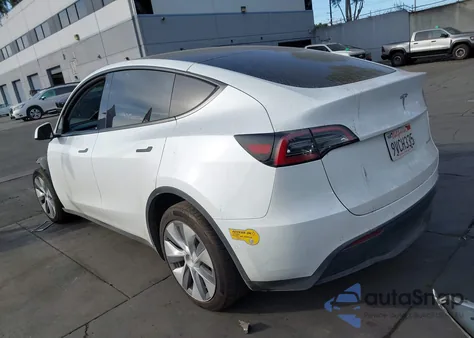 2022 Tesla Model Y Long Range Dual Motor All-Wheel Drive z USA, uszkodzony, nr VIN 7SAYGDEEXNF402355